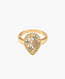 Teardrop-shaped gold-plated ring with turquoise enamel flowers and crystal pavé detail on cream background