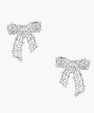 Filigree bow-shaped earrings with marquise center stone and lattice ribbon tails in gold and silver finishes