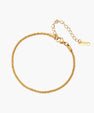 Delicate 18K gold-plated stainless steel bracelet with textured beaded chain on cream background